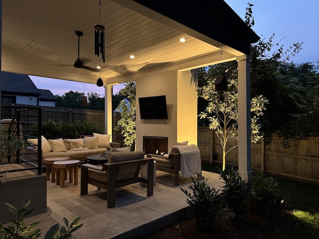 1609 Marsden Ave, Nashville, TN 37216 - fenced backyard with a patio, an outdoor living space with a fireplace, and a ceiling fan