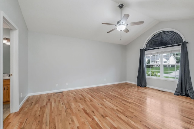 3408 Wj Robinson Rd, Cookeville, TN 38506 - unfurnished room featuring light wood-style floors, vaulted ceiling, ceiling fan, baseboards, and a sink