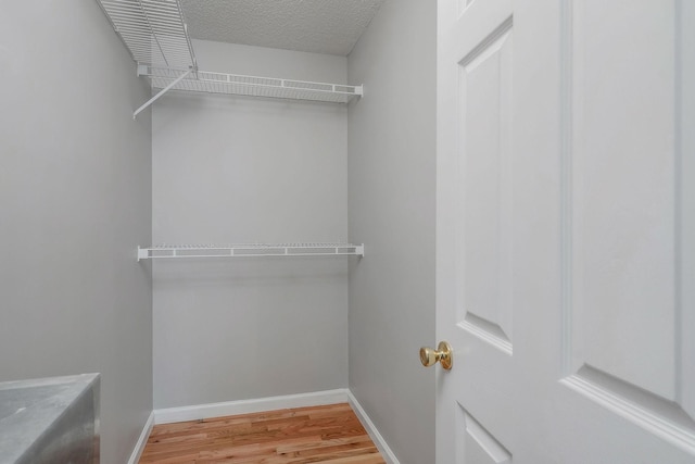 3408 Wj Robinson Rd, Cookeville, TN 38506 - walk in closet featuring wood finished floors