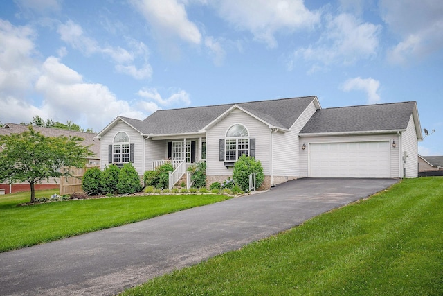 3408 Wj Robinson Rd, Cookeville, TN 38506 - ranch-style house with driveway, an attached garage, a front yard, and roof with shingles