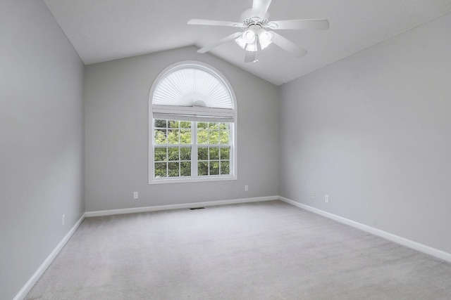 3408 Wj Robinson Rd, Cookeville, TN 38506 - spare room featuring carpet flooring, vaulted ceiling, baseboards, and a ceiling fan