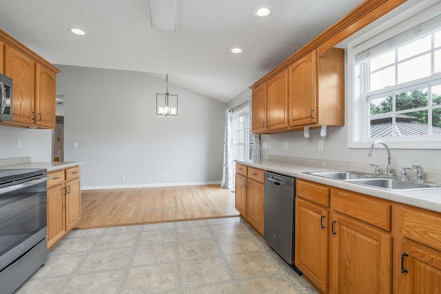 3408 Wj Robinson Rd, Cookeville, TN 38506 - kitchen featuring stainless steel appliances, vaulted ceiling, a sink, recessed lighting, and light countertops