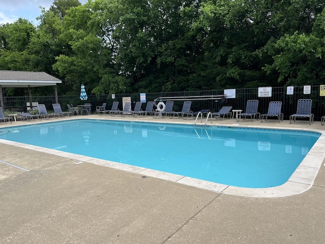 3323 Troy Rd, Lebanon, TN 37087 - community pool with a patio area and view of wooded area