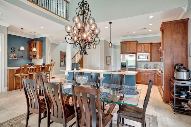 1161 Chloe Dr, Gallatin, TN 37066 - dining space with ornamental molding, stairway, light tile patterned floors, recessed lighting, and a chandelier