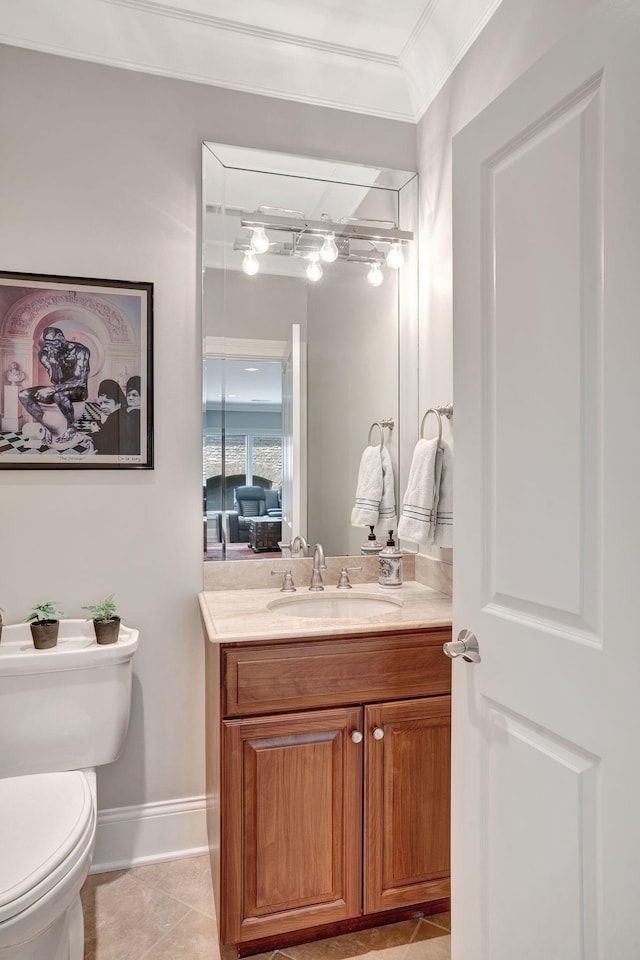 1161 Chloe Dr, Gallatin, TN 37066 - bathroom featuring vanity, toilet, crown molding, tile patterned floors, and baseboards