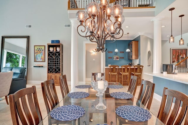 1161 Chloe Dr, Gallatin, TN 37066 - dining space with a high ceiling, a chandelier, light tile patterned flooring, baseboards, and recessed lighting