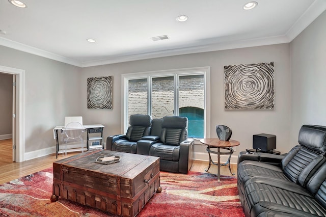 1161 Chloe Dr, Gallatin, TN 37066 - living area featuring light wood finished floors, crown molding, recessed lighting, and baseboards