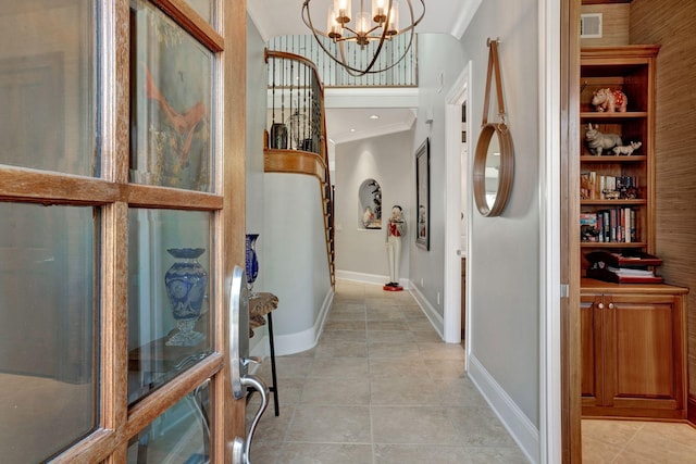 1161 Chloe Dr, Gallatin, TN 37066 - entrance foyer with a chandelier, crown molding, baseboards, and light tile patterned floors