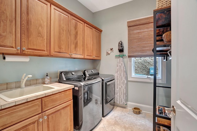 1161 Chloe Dr, Gallatin, TN 37066 - laundry room featuring cabinet space, separate washer and dryer, and light tile patterned floors