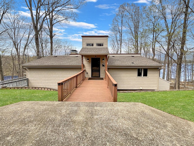 695 Bayshore Dr, Cadiz, KY 42211 - view of front of property featuring a front yard and a shingled roof