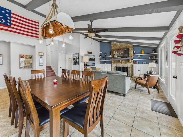 695 Bayshore Dr, Cadiz, KY 42211 - dining area featuring a ceiling fan, light tile patterned floors, and a stone fireplace