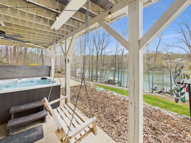 695 Bayshore Dr, Cadiz, KY 42211 - view of patio / terrace with a hot tub and a water view