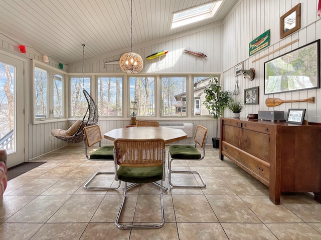 695 Bayshore Dr, Cadiz, KY 42211 - dining area with a skylight, a chandelier, light tile patterned floors, and high vaulted ceiling