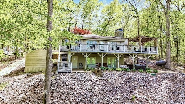 695 Bayshore Dr, Cadiz, KY 42211 - back of house with a wooden deck, a chimney, and stairway