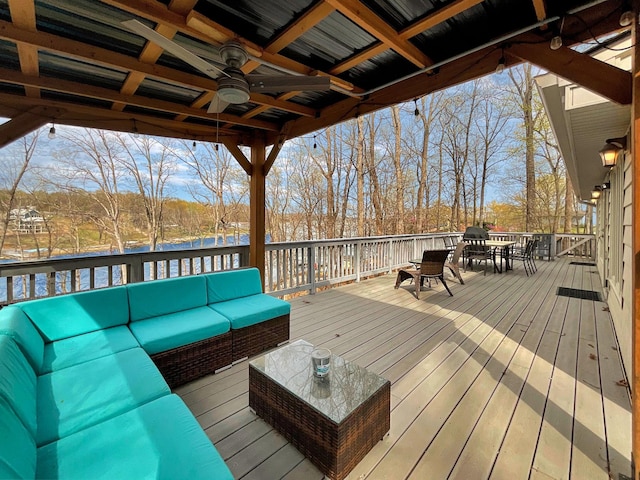 695 Bayshore Dr, Cadiz, KY 42211 - wooden deck with outdoor dining space, an outdoor hangout area, and ceiling fan