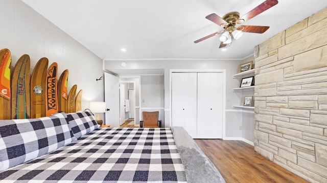 695 Bayshore Dr, Cadiz, KY 42211 - bedroom featuring wood finished floors, a closet, a ceiling fan, and recessed lighting