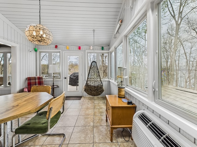695 Bayshore Dr, Cadiz, KY 42211 - sunroom featuring tile patterned flooring, plenty of natural light, and an AC wall unit