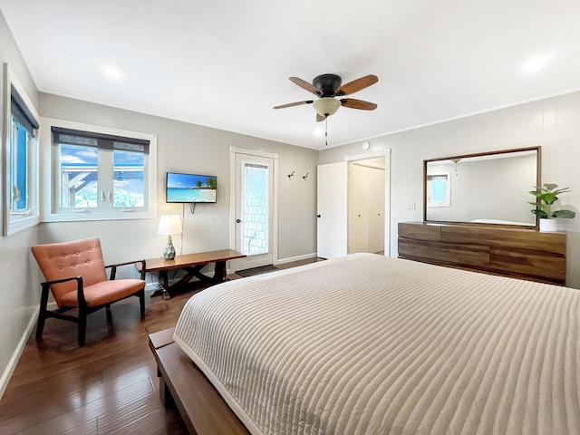 695 Bayshore Dr, Cadiz, KY 42211 - bedroom with multiple windows, wood finished floors, baseboards, and a ceiling fan
