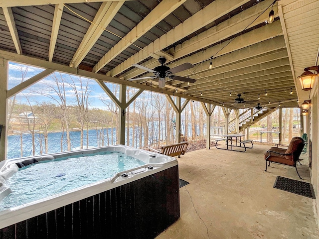695 Bayshore Dr, Cadiz, KY 42211 - view of patio / terrace with a ceiling fan, a hot tub, and a water view