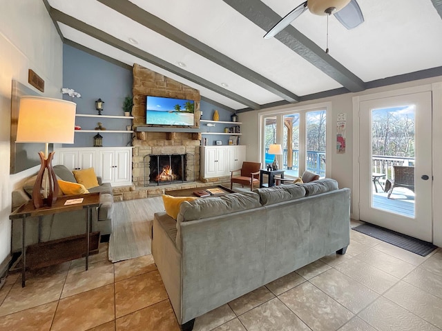 695 Bayshore Dr, Cadiz, KY 42211 - living area with a stone fireplace, ceiling fan, and light tile patterned flooring