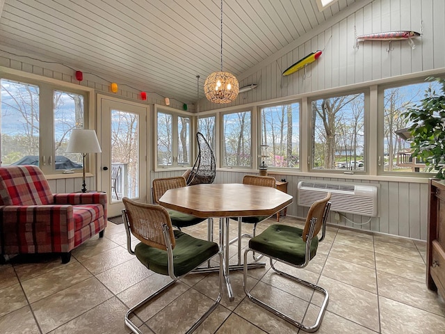 695 Bayshore Dr, Cadiz, KY 42211 - sunroom featuring an AC wall unit, wooden walls, vaulted ceiling, a chandelier, and tile patterned floors