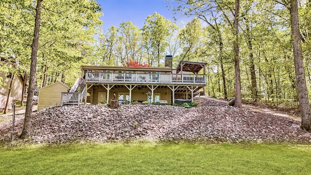 695 Bayshore Dr, Cadiz, KY 42211 - rear view of property with a wooden deck, a chimney, and stairway