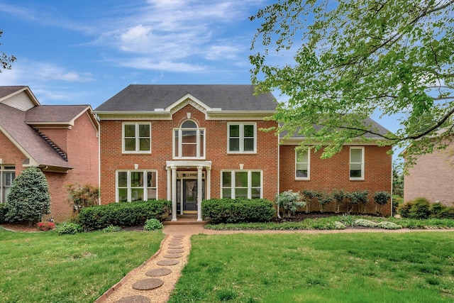 213 Andover Way, Nashville, TN 37221 - colonial house with a front lawn and brick siding