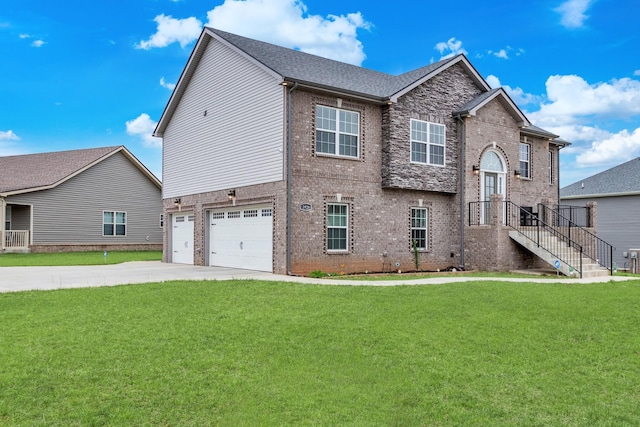1928 Sydney Louise Dr, Clarksville, TN 37042 - view of front of property featuring brick siding, an attached garage, concrete driveway, and a front yard