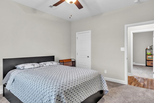 1928 Sydney Louise Dr, Clarksville, TN 37042 - carpeted bedroom with baseboards and a ceiling fan