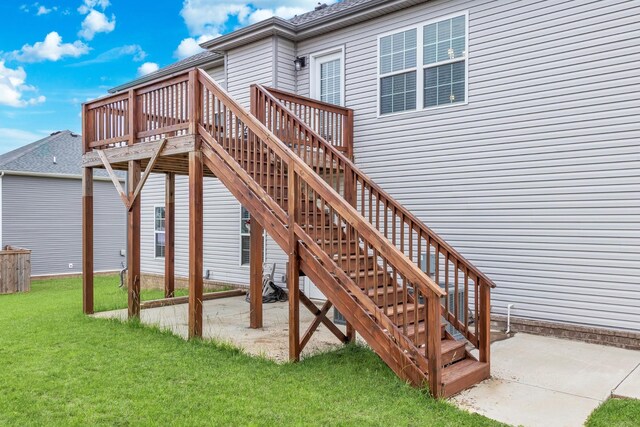 1928 Sydney Louise Dr, Clarksville, TN 37042 - wooden deck featuring a lawn, a patio, and stairs
