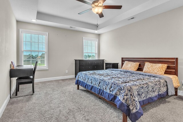 1928 Sydney Louise Dr, Clarksville, TN 37042 - carpeted bedroom with baseboards, a raised ceiling, and a ceiling fan