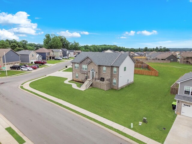 1928 Sydney Louise Dr, Clarksville, TN 37042 - view of front of property featuring a residential view, an attached garage, and a front yard