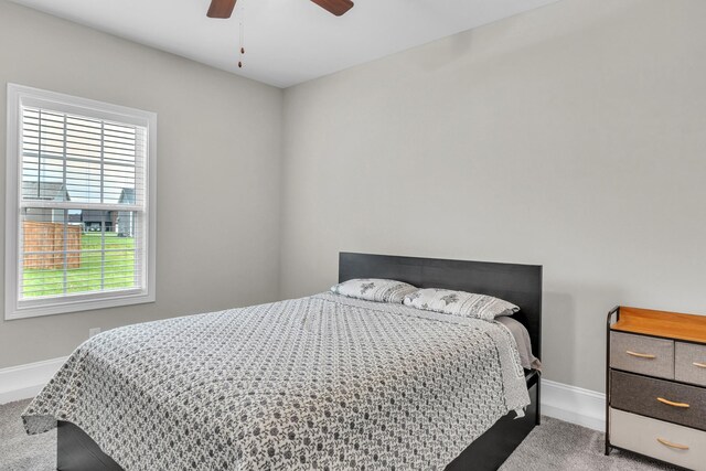 1928 Sydney Louise Dr, Clarksville, TN 37042 - carpeted bedroom featuring baseboards and a ceiling fan