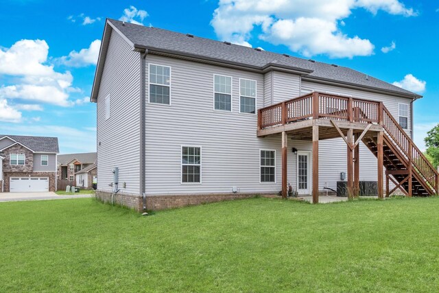 1928 Sydney Louise Dr, Clarksville, TN 37042 - back of house with a wooden deck, a yard, and stairway