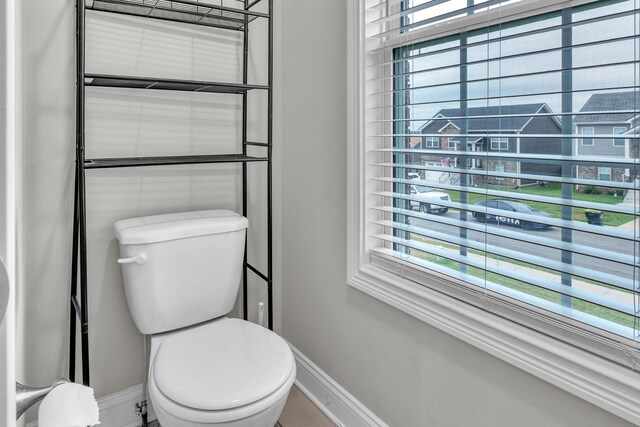 1928 Sydney Louise Dr, Clarksville, TN 37042 - bathroom with baseboards, healthy amount of natural light, and toilet
