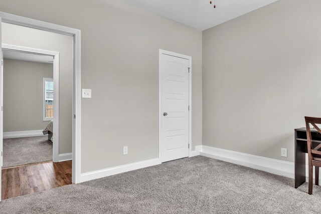 1928 Sydney Louise Dr, Clarksville, TN 37042 - unfurnished bedroom featuring carpet floors and baseboards