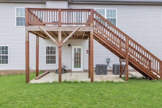 1928 Sydney Louise Dr, Clarksville, TN 37042 - rear view of property featuring a patio, central AC unit, a deck, a lawn, and stairway