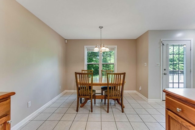 991 Wing Tip Cir, Hopkinsville, KY 42240 - dining room featuring a chandelier, light tile patterned floors, and baseboards