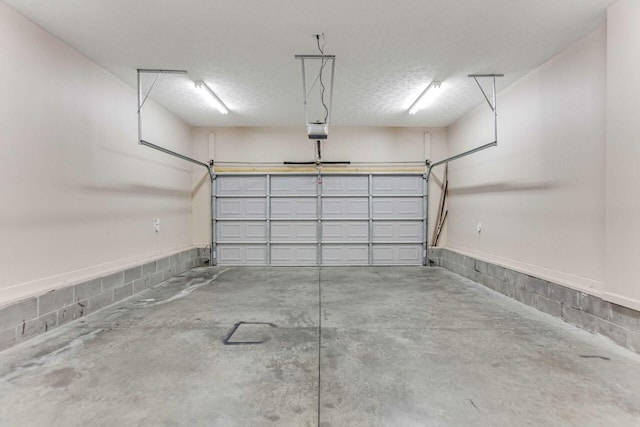 991 Wing Tip Cir, Hopkinsville, KY 42240 - garage featuring a garage door opener