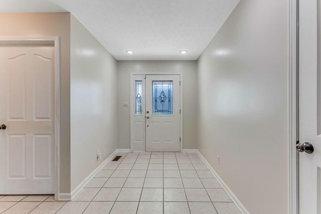 991 Wing Tip Cir, Hopkinsville, KY 42240 - entryway featuring light tile patterned floors, baseboards, and recessed lighting