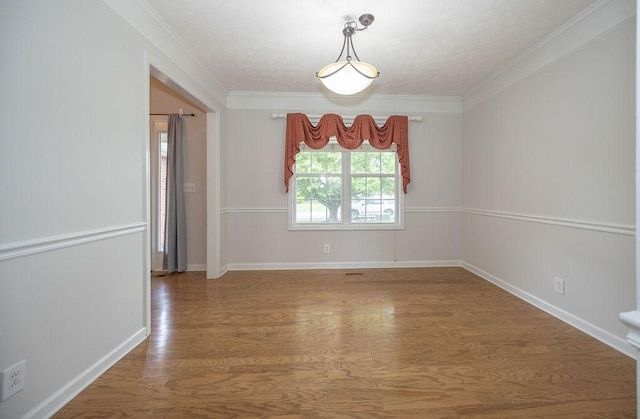 2818 Crazy Horse, Murfreesboro, TN 37127 - unfurnished room with wood finished floors, crown molding, and baseboards