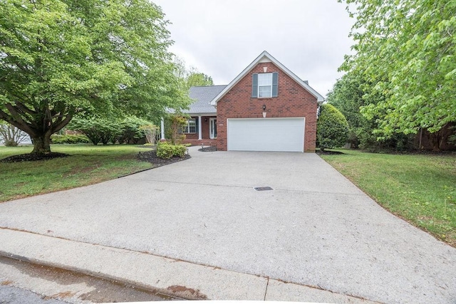 2818 Crazy Horse, Murfreesboro, TN 37127 - traditional home featuring an attached garage, brick siding, concrete driveway, and a front yard