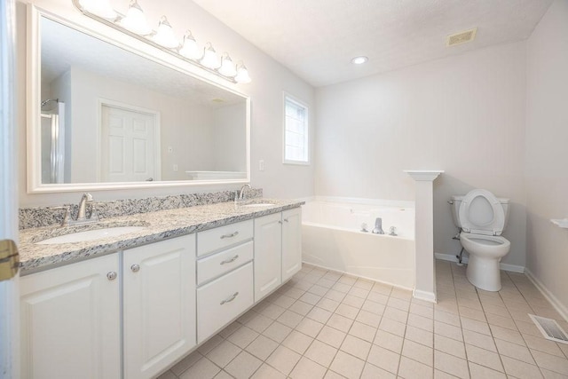2818 Crazy Horse, Murfreesboro, TN 37127 - bathroom with tile patterned flooring, a garden tub, toilet, double vanity, and baseboards