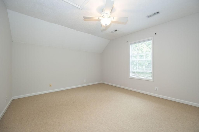 2818 Crazy Horse, Murfreesboro, TN 37127 - additional living space featuring light carpet, lofted ceiling, baseboards, and a ceiling fan