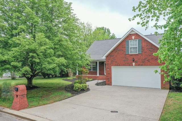 2818 Crazy Horse, Murfreesboro, TN 37127 - traditional home with brick siding, driveway, a garage, a front lawn, and roof with shingles