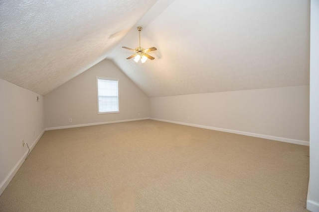 2818 Crazy Horse, Murfreesboro, TN 37127 - bonus room with lofted ceiling, light carpet, a ceiling fan, baseboards, and a textured ceiling