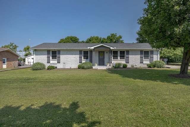 3120 Larkspur Dr, Nashville, TN 37207 - ranch-style home featuring a front lawn and brick siding