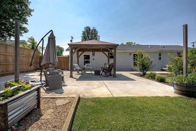 3120 Larkspur Dr, Nashville, TN 37207 - rear view of house with a gazebo, a patio area, and brick siding