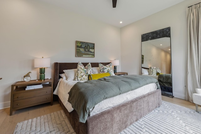 1016B 9th Ave S, Nashville, TN 37203 - bedroom with wood finished floors, baseboards, and ceiling fan