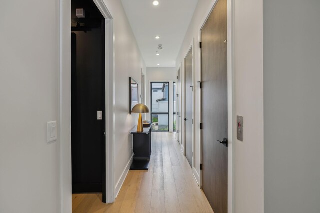 1016B 9th Ave S, Nashville, TN 37203 - hallway with light wood-type flooring, recessed lighting, and baseboards